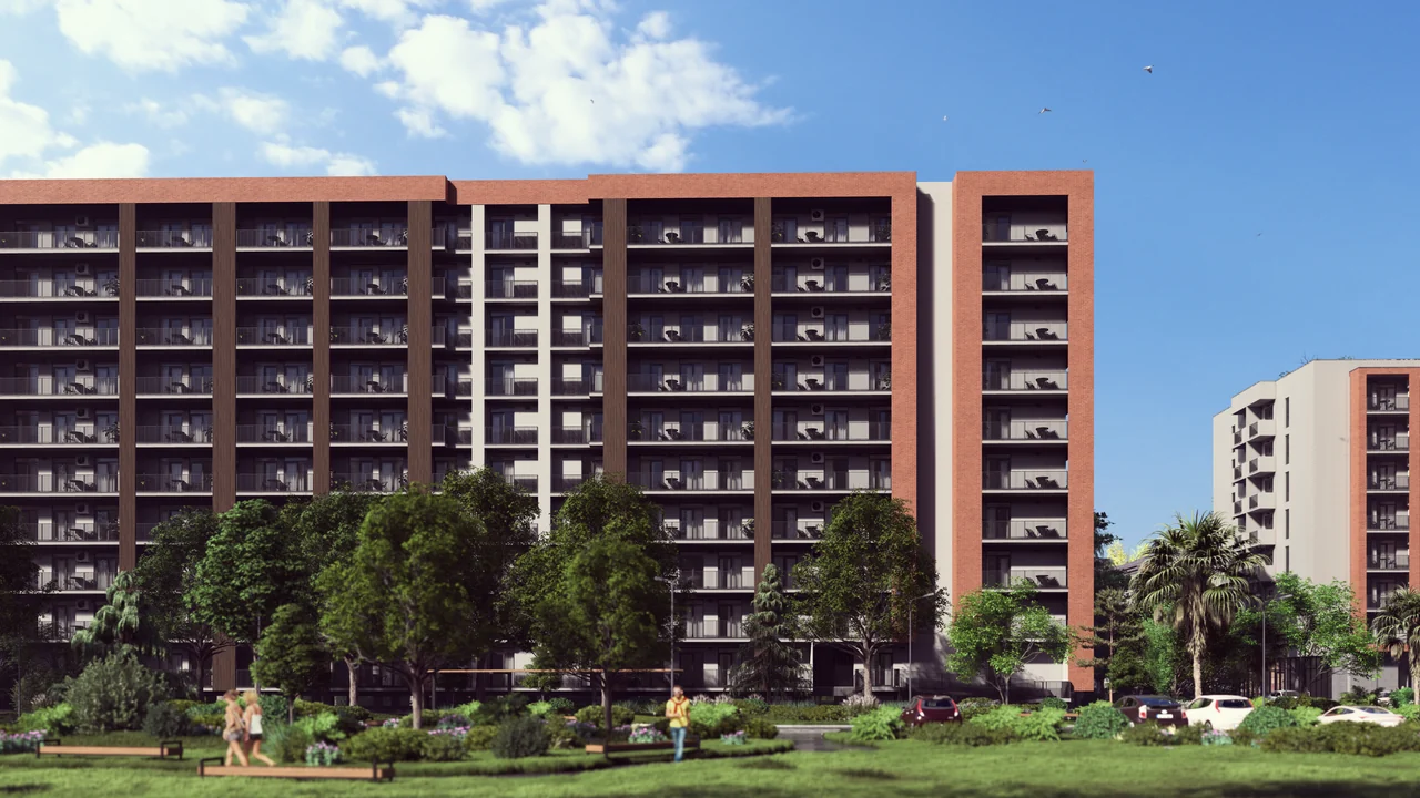 The Block E façade behind the courtyard trees
